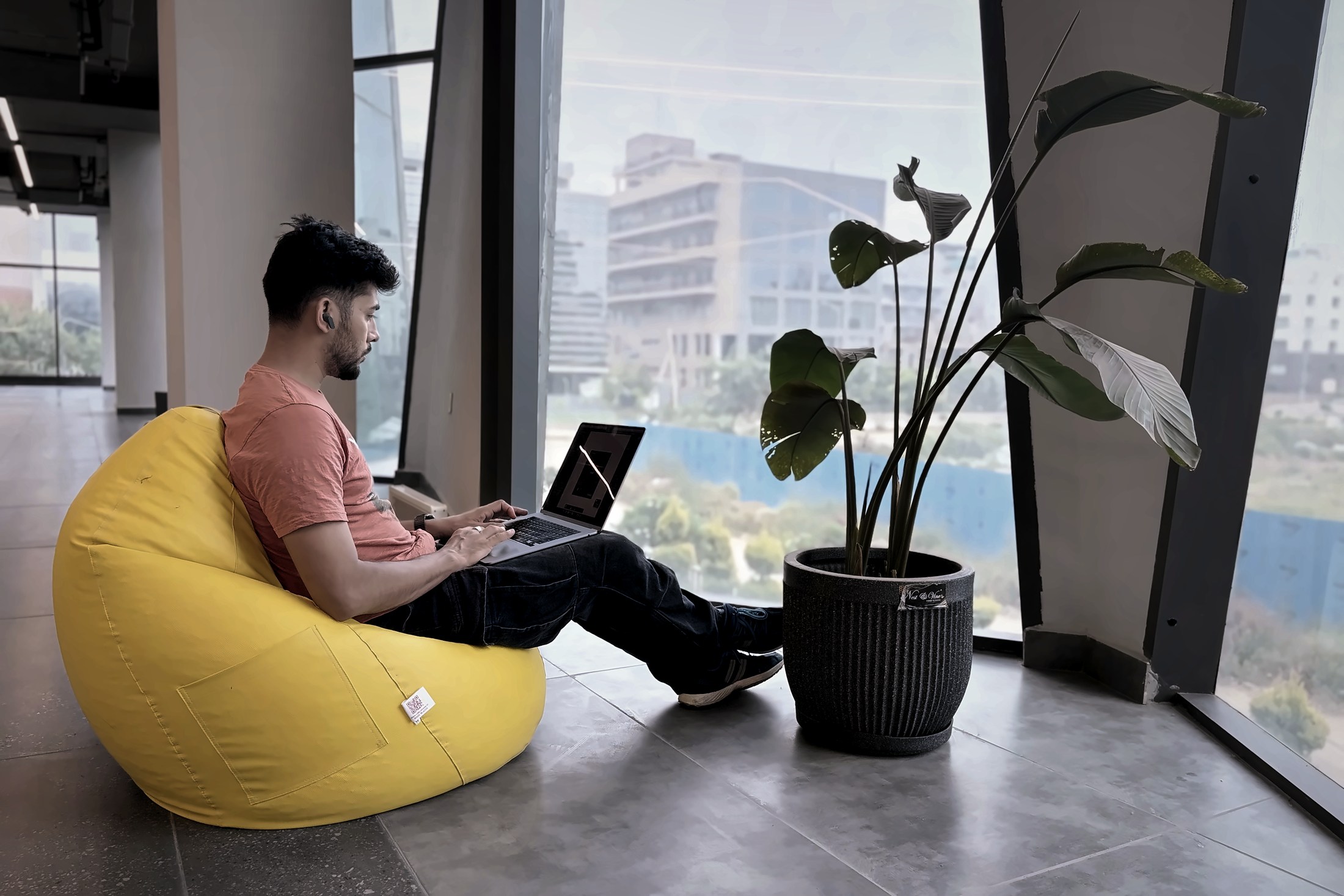 A quieter corner — the beanbag by the window wall